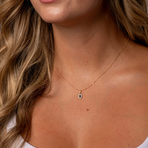9ct Gold Sapphire Cubic Zirconia Oval Halo Pendant Necklace